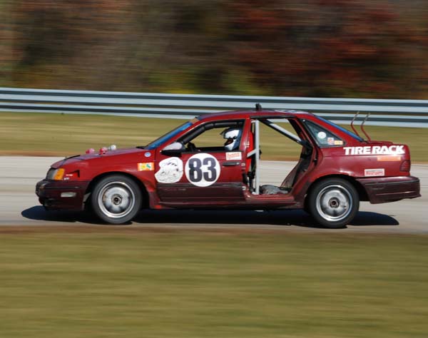 Red Rocket Ratnest Revival Ford Taurus SHO at 24 Hours of LeMons Chicago race